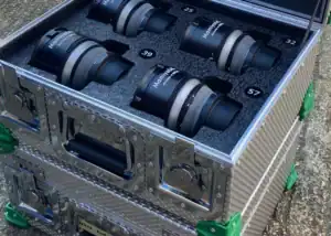 Aluminium flight case with custom foam inserts holding Mamlya lenses with labels