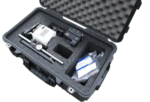 Optical camera gear stored securely in Peli 1510 protective case for professional use.